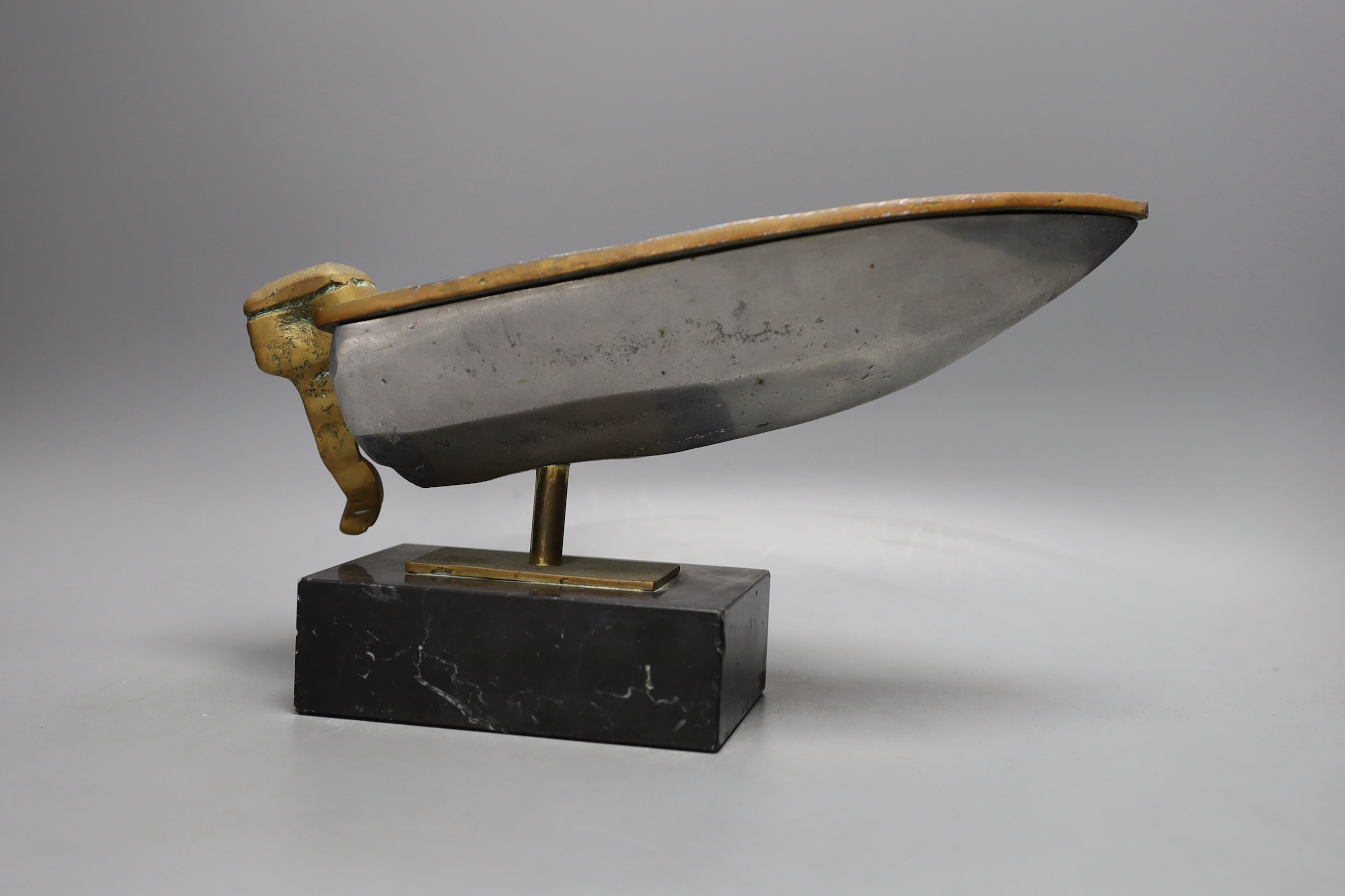 A brass and aluminium model of a speedboat on marble base, 30cm